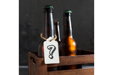 front-view-beer-glass-bottles-crate-with-tag